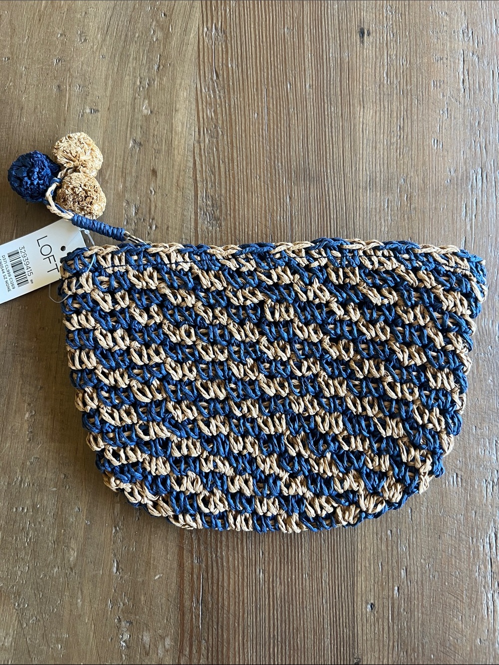 LOFT Navy and Natural Straw Crochet Zip Clutch pompom